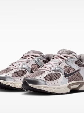 Nike Women’s Running Sneakers in Light Pink and Silver Metallic
